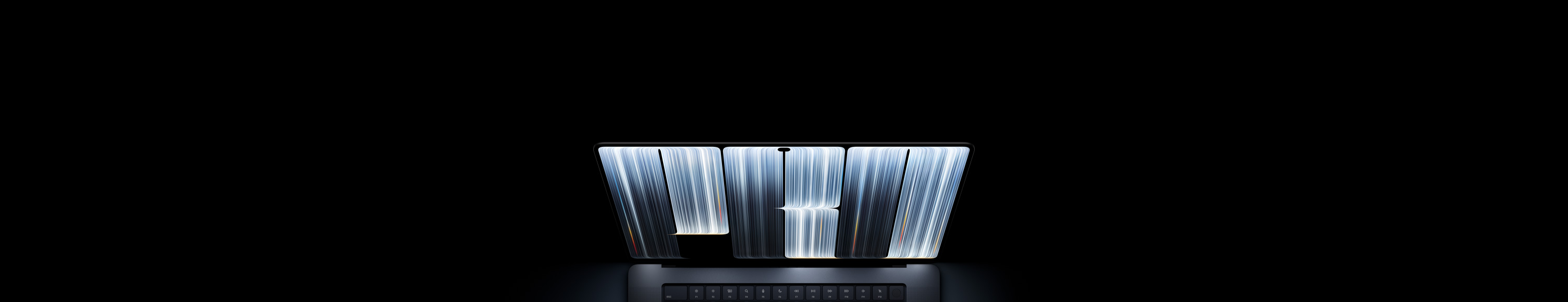 جهاز MacBook Pro مع شاشة PROLED XDR، لون أسود فلكي، الشاشة تعرض أجساماً على شكل شرائط مزينة بكثافة بخطوط متوهجة متفاوتة العرض تشكل معاً كلمة Pro.
