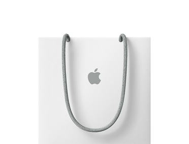 Bílá taška Apple, šedé šňůrky na držení, vycentrované logo Apple